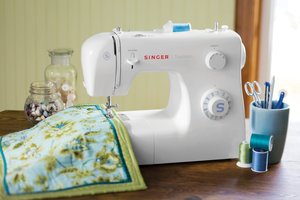Выбор ручной и электронной швейной машинки для дома